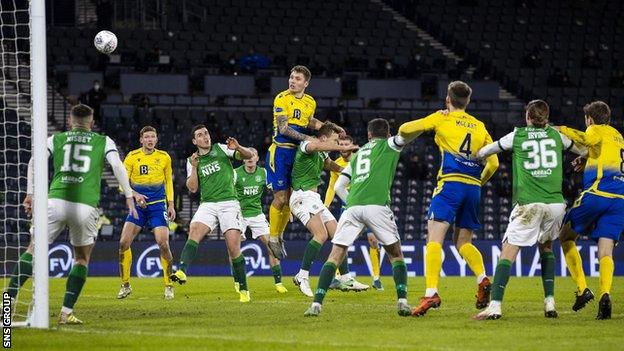 Jason Kerr rises to head home the opening goal at Hampden