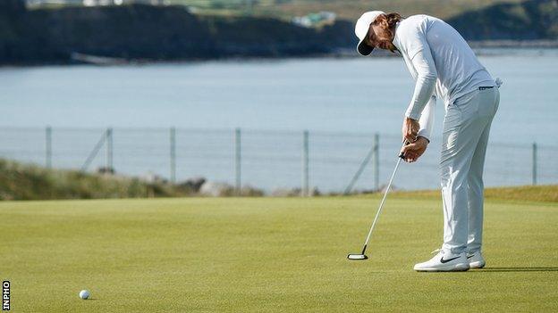 Tommy Fleetwood attempts a birdie putt on the third green at Lahinch