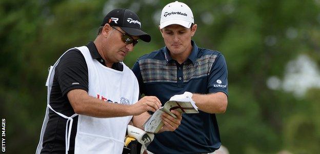 Justin Rose and Mark Fulcher during the 2013 US Open