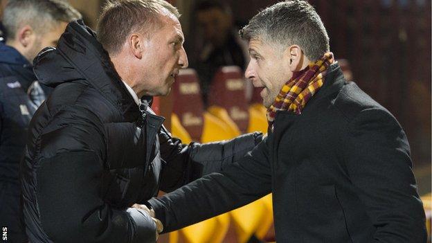 Celtic boss Brendan Rodgers shakes hands with Motherwell counterpart Stephen Robinson