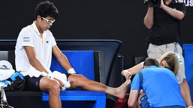 Hyeon Chung receiving treatment during the second set