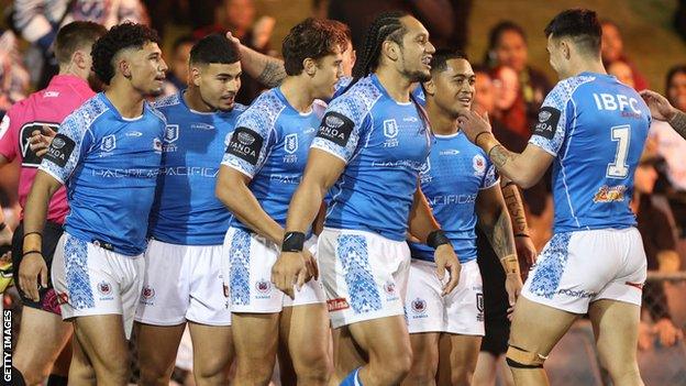 Samoan players celebrate