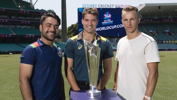 Afghanistan's Rashid Khan, Australia's Alex Carey and England's Tom Curran with the Men's T20 World Cup