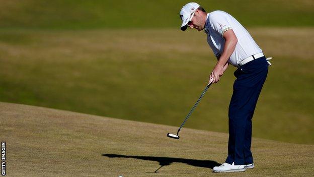 Marc Warren hits a putt during round two of the US Open