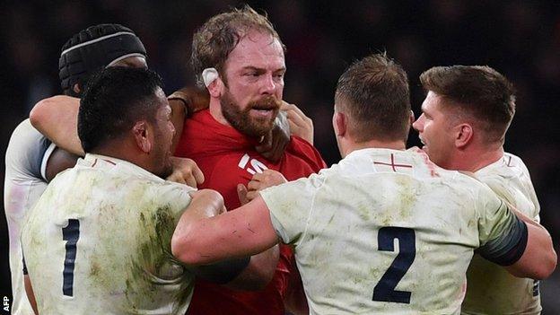 Wales captain Alun Wyn Jones faces of with several England players