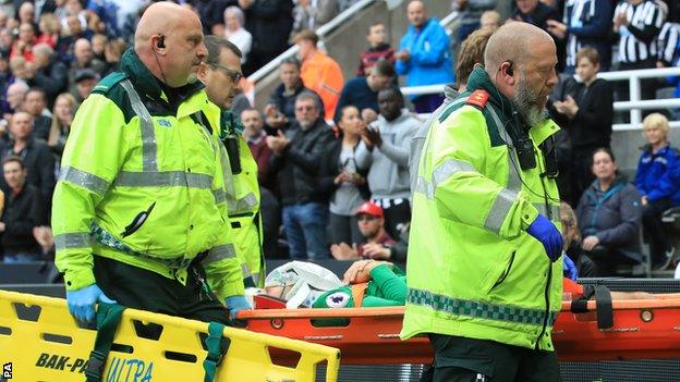 Glenn Murray receives treatment