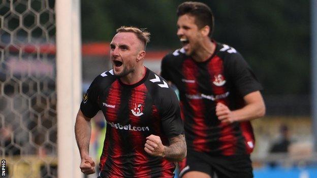 Jude Winchester celebrates after notching Crusaders' second goal against Bruno Magpies of Gibraltar