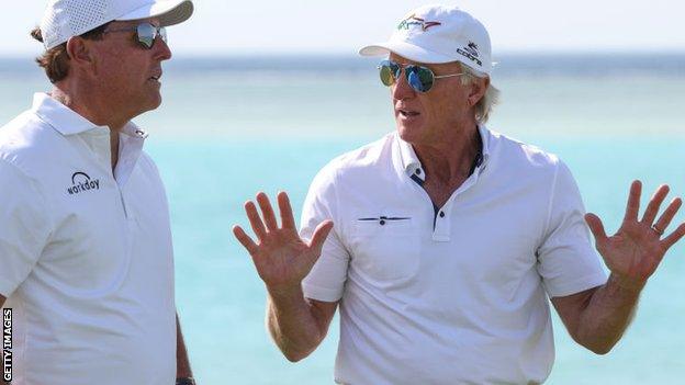 Phil Mickelson and Greg Norman talking in Saudi Arabia