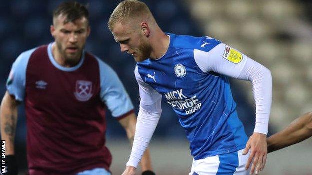 Frazer Blake-Tracy (right) in action for Peterborough