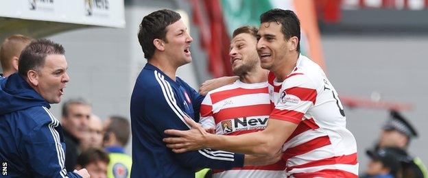 Martin Canning celebrates Hamilton's opener with scorer Gramoz Kurtaj (centre)