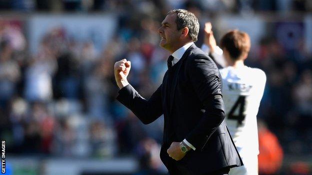 Swansea City manager Paul Clement celebrates the victory over Stoke City