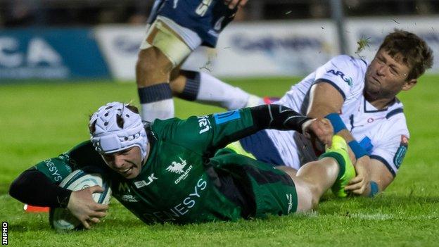 Mack Hansen reaches to score one of Connacht's five tries in Galway