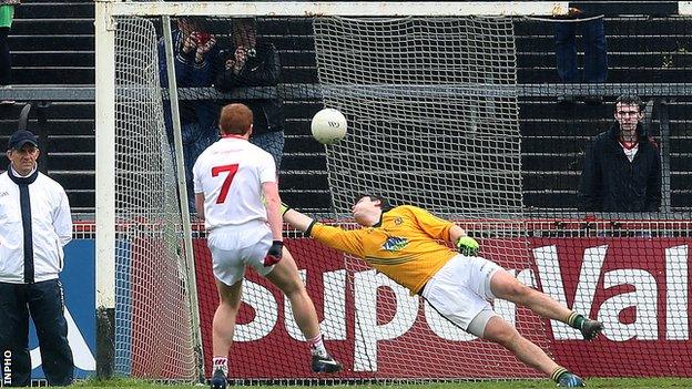 Peter Harte watches his penalty hit the Meath net