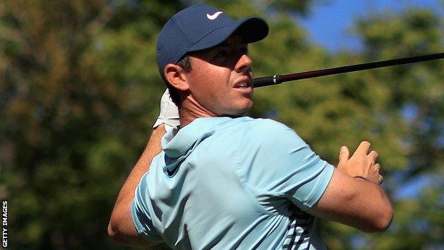 Rory McIlroy watches an errant drive at the 15th hole on Thursday in Florida