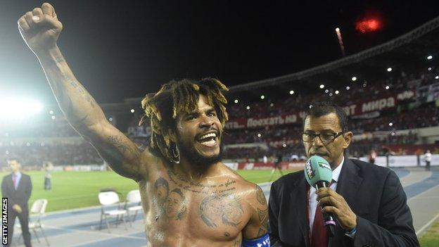 Panama's Roman Torres celebrates