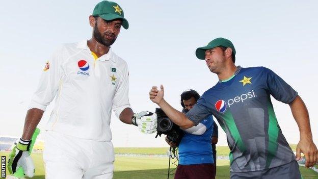 Pakistan's Shoaib Malik is congratulated