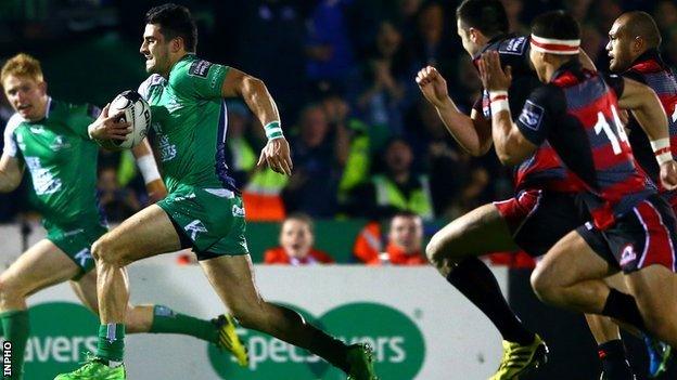 Connacht's Tiernan O'Halloran sprints clear to score a try against Edinburgh