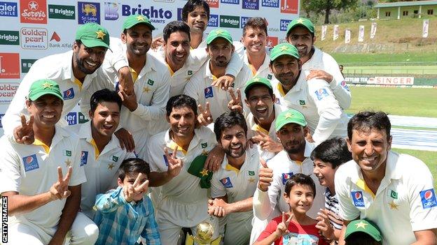 Pakistan celebrate with the Test series trophy