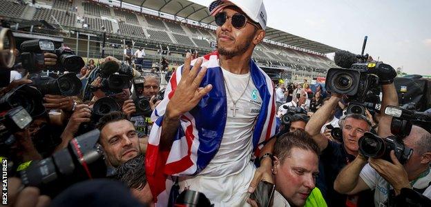 Mercedes F1 driver Lewis Hamilton celebrates winning the 2017 Formula 1 drivers championship