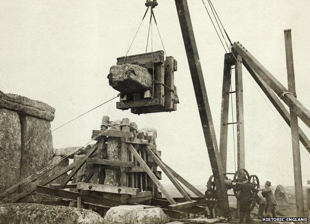 Lintel being lifted for replacement after adjustment of stones 6 and 7, Stonehenge, Wiltshire 17 March 1920. Office of Works