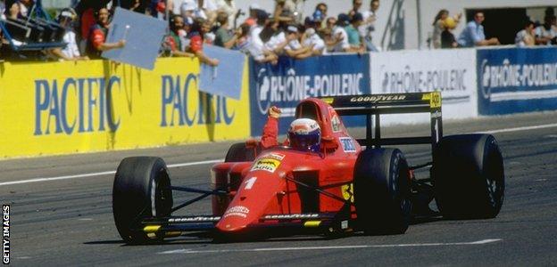 Alain Prost of Ferrari wins the 1990 French Grand Prix