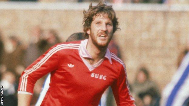 Sir Ian Botham plays for Scunthorpe against Wigan in March 1980