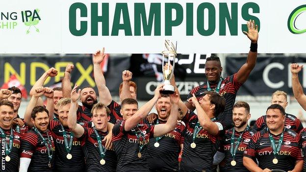 Saracens celebrate winning the Championship