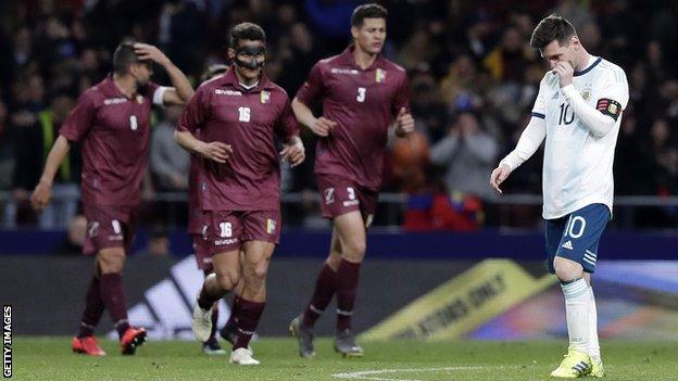 Lionel Messi looks disappointed after Venezuela score