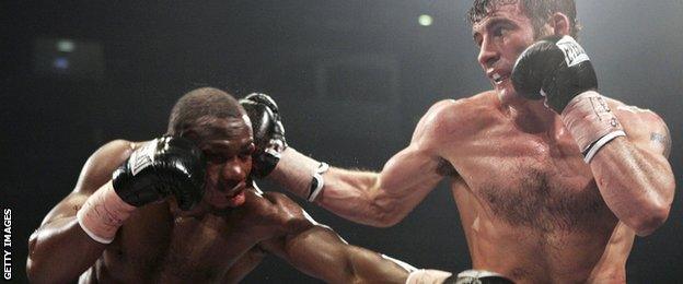 Joe Calzaghe catches Jeff Lacy with a right