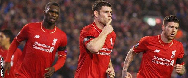 James Milner (centre) celebrates equalising from the penalty spot for Liverpool against Bordeaux