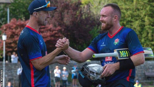 Danny Lamb (right) celebrates Lancashire's win over Sussex