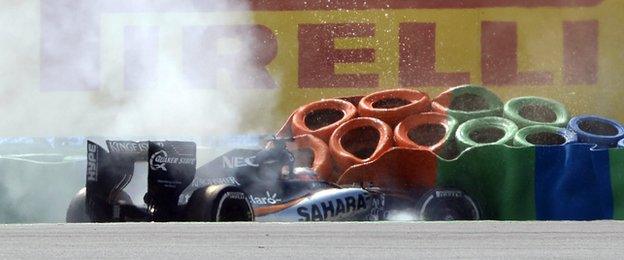 Nico Hulkenberg's front wing failed and caused the Force India to crash into the tyre wall