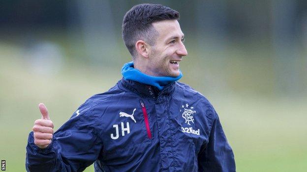 Rangers midfielder Jason Holt gives the thumbs up during training