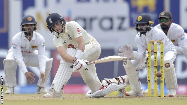 England captain Joe Root plays a sweep shot against Sri Lanka