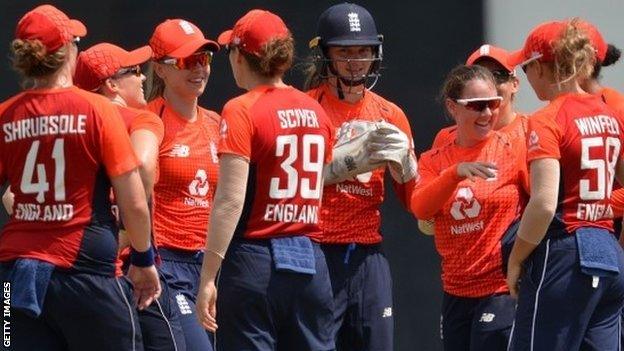 Linsey Smith celebrates with her England team-mates