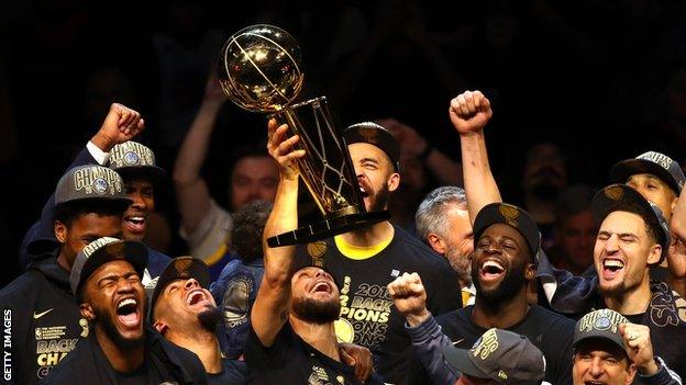 Steph Curry and the Golden State Warriors celebrate winning the 2018 NBA Championship