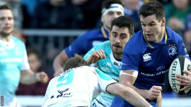 Kieran Marmion of Connacht challenges Leinster’s Johnny Sexton