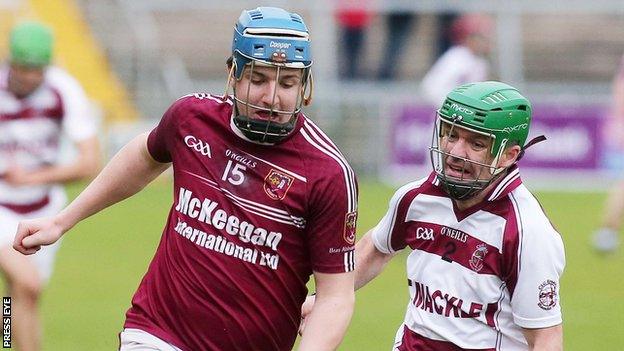 Michael Kearney and Christy McNaughton in action at the Athletic Grounds