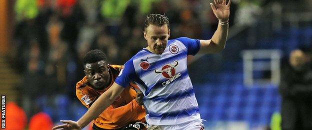 Reading's Liam Moore (right) in action against Wolves