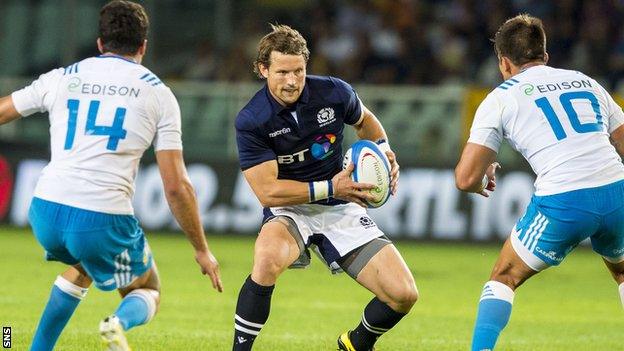 Peter Horne playing for Scotland against Italy