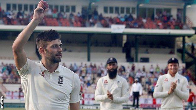 Mark Wood celebrates as he leaves the field