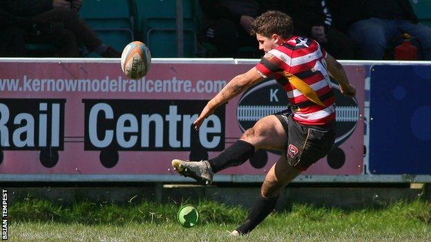 Laurence May kicks a penalty