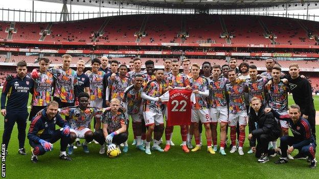 The Arsenal camp held up a shirt with Pablo Mari's name on before their game against Nottingham Forest