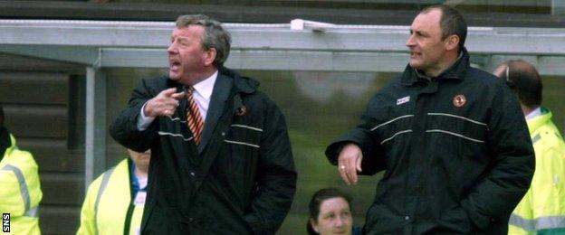 Alex Smith and Maurice Malpas in the Dundee United dugout at Tannadice