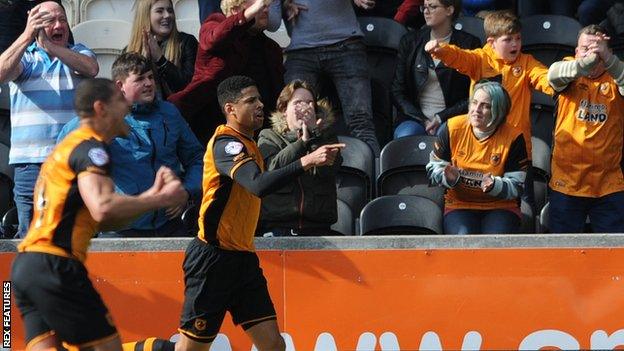 Curtis Davies (right) celebrates his first-half goal against Bristol City