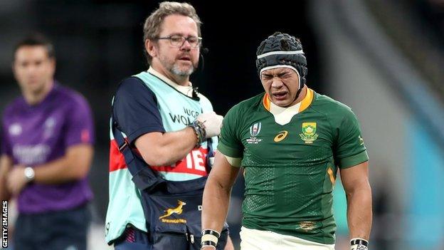 Cheslin Kolbe of South Africa receives treatment during the Rugby World Cup 2019 Quarter Final match between Japan and South Africa at the Tokyo Stadium on October 20, 2019 in Chofu, Tokyo, Japan. (Photo by Cameron Spencer/Getty Images)