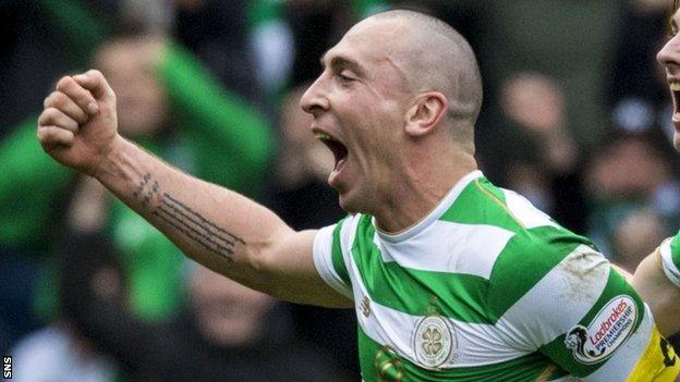 Celtic captain Scott Brown celebrates beating Rangers