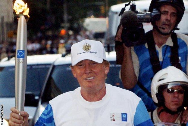 Donald Trump with the Olympic flame