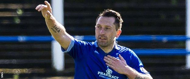 Queen of the South striker Stephen Dobbie celebrates