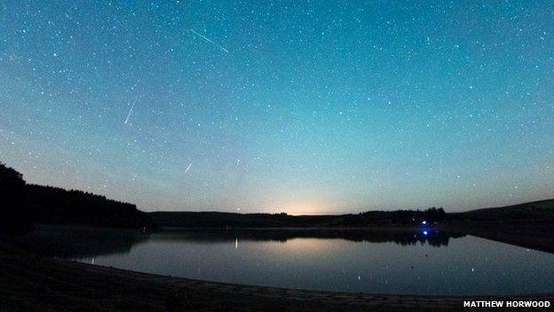 Perseid meteor shower over Usk reservoir, Brecon